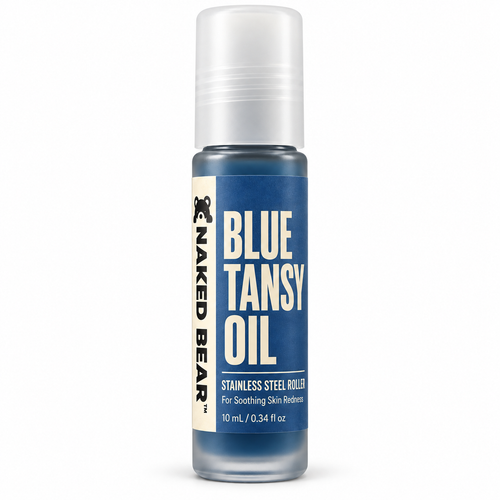 Naked Bear Blue Tansy Oil in a 10 ml frosted glass roll-on bottle with a blue label and deep blue oil inside